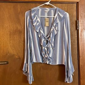 American Eagle long sleeve blue and white shirt. Lace up front. Never worn.